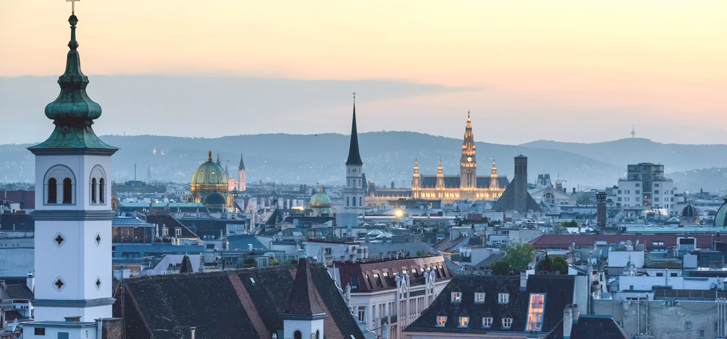 Image across the rooftops of Vienna at sunset