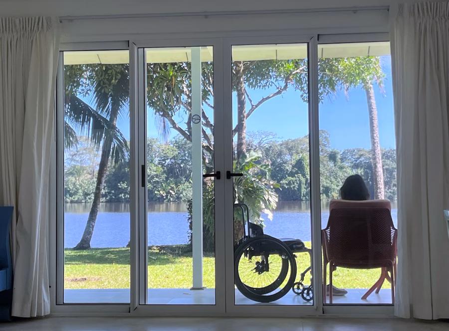 Image of Jan on her balcony at Tortuga