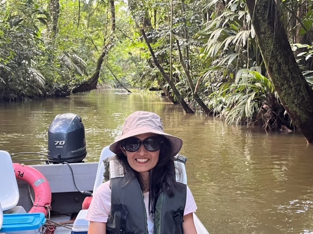 Image of Jan enjoying a boat ride at Tortuga