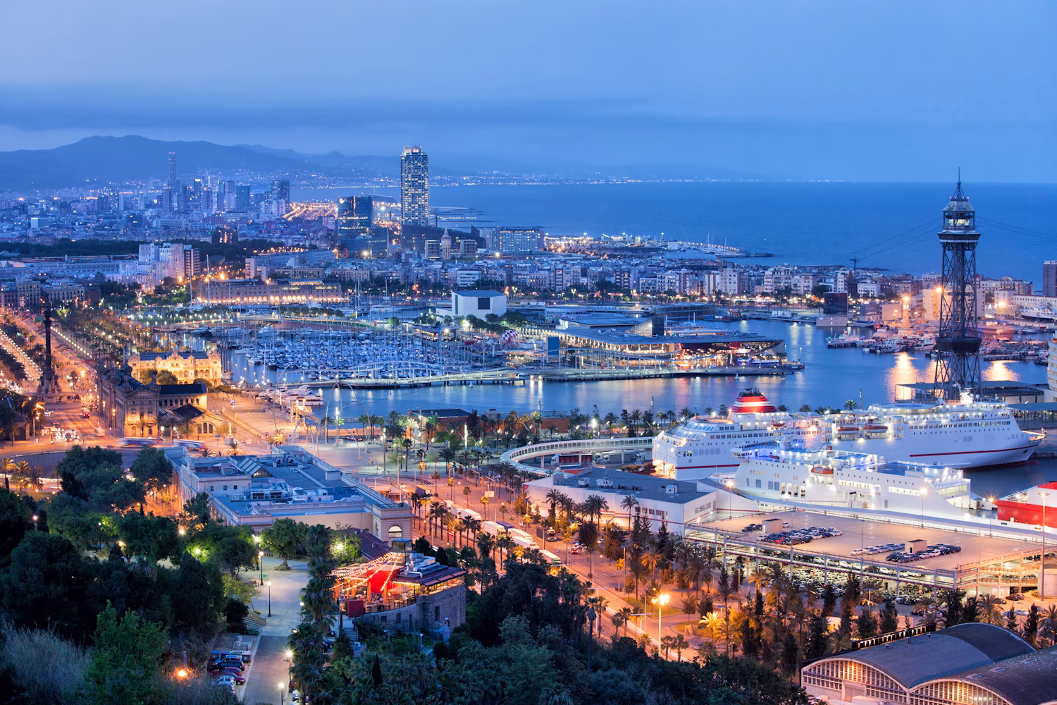 Nighttime image of Barcelona and its cruise port