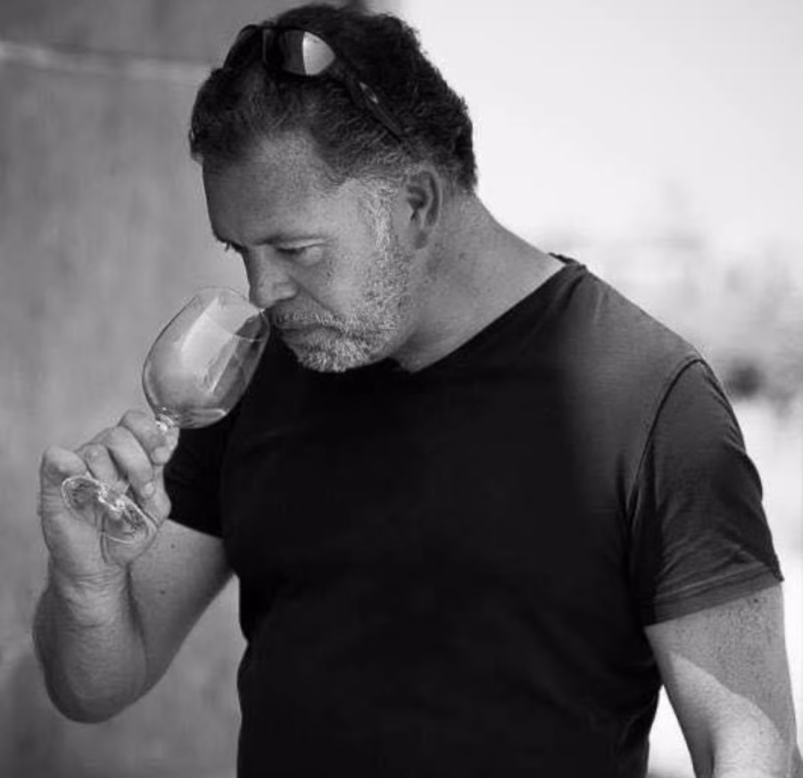 Image of Huw Davies at a wine-tasting