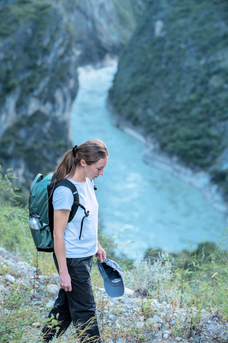Image of Kendra Tombolato enjoying hiking the Tiger Leaping Gorge