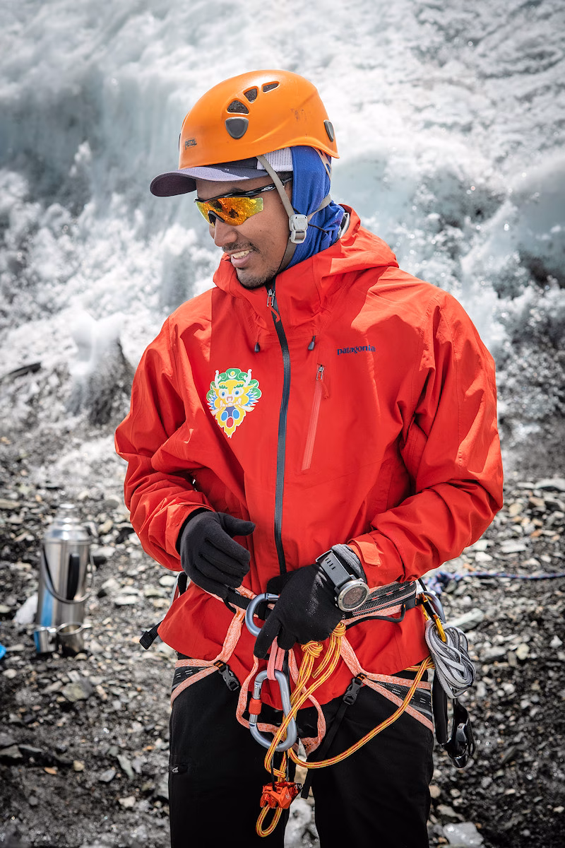Image shows Ang Tshering Lama at Everest Base Camp.