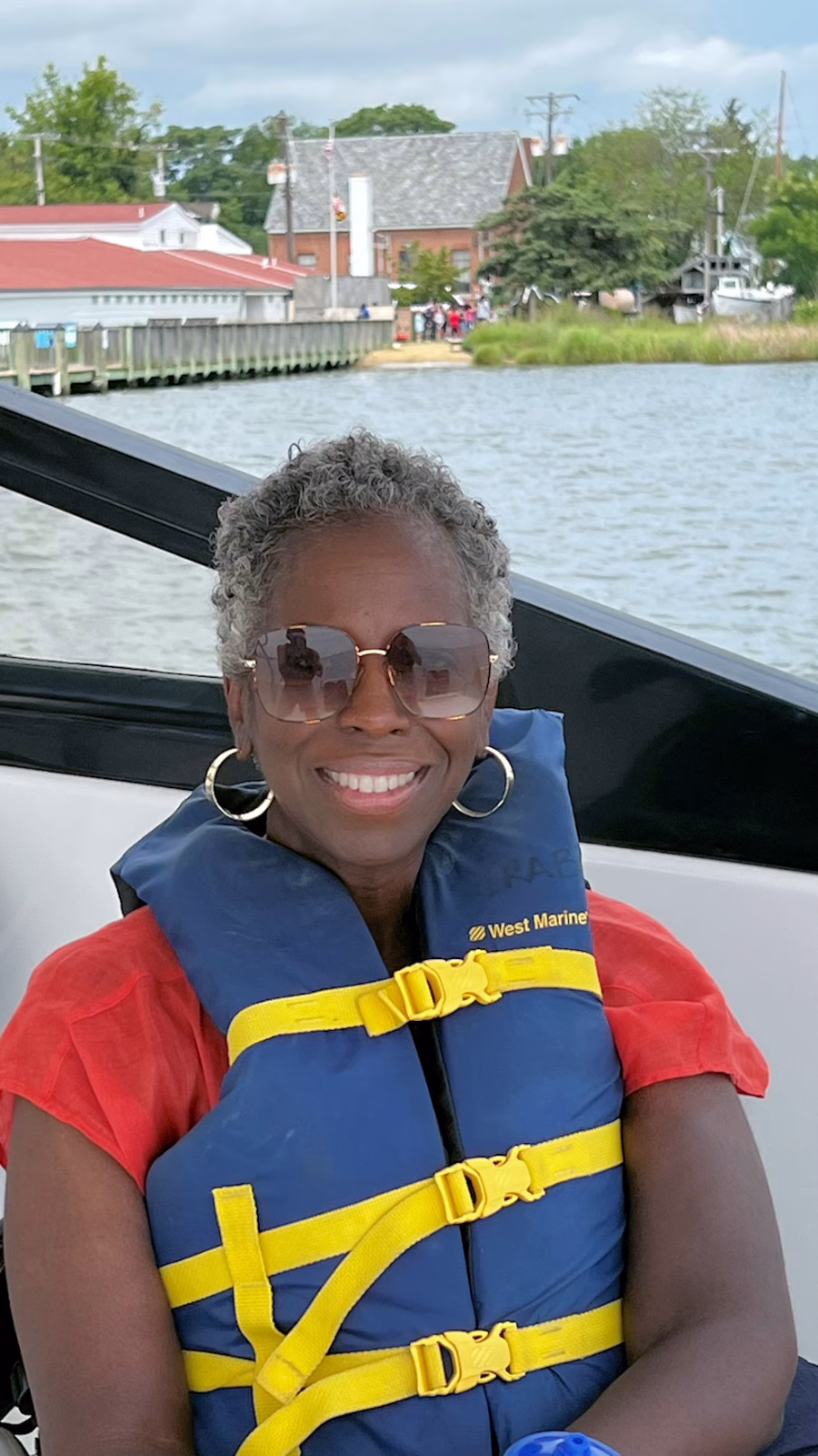 Carmen Daniels Jones is pictured on a yacht enjoying sailing at Annapolis