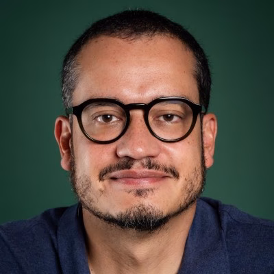 Image shows a headshot of Adrian Garcia