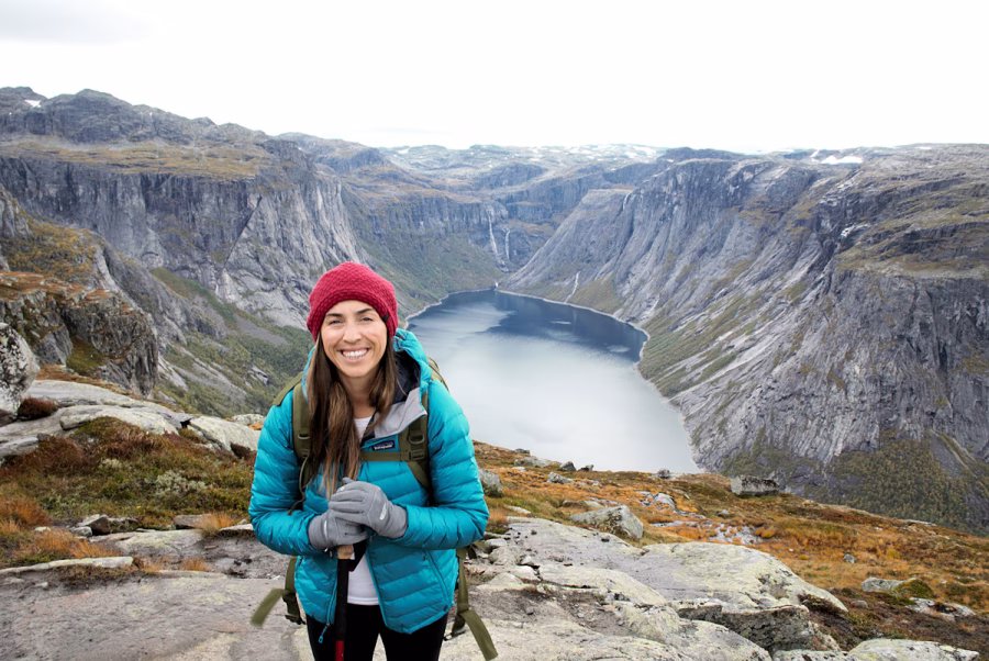 Image shows Jaimie enjoying hiking in a hilly area